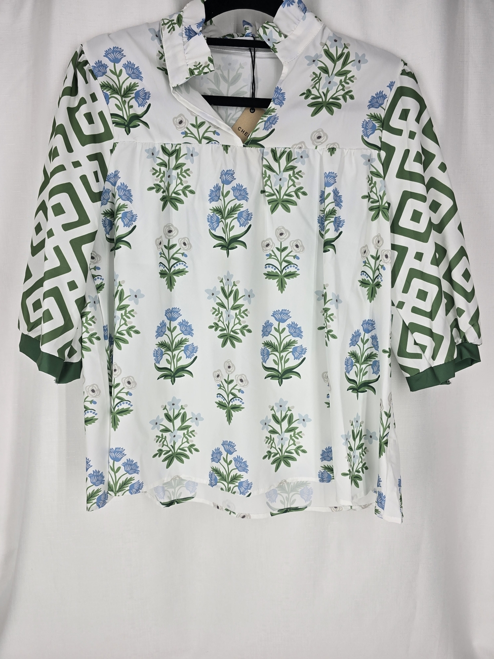 White Floral Blouse with Green Geometric Sleeves